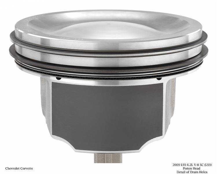 X09PT_EP029.jpg - 2009 LS9 6.2L V-8 SC (LS9) Piston Head Detail of Drain Holes for Chevrolet Corvette. X09PT_EP029  (United States)