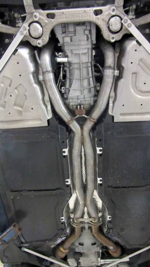 A picture containing old, sitting, bicycle, engine

Description automatically generated